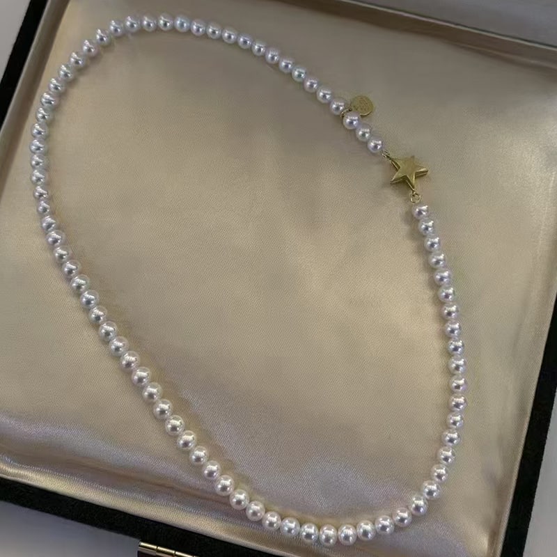 Freshwater Pearl Star Magnet Clasp Necklace: 5-6mm nearly round, basically flawless, extremely bright freshwater pearl star magnet buckle necklace
