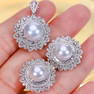 Large white pearl earrings