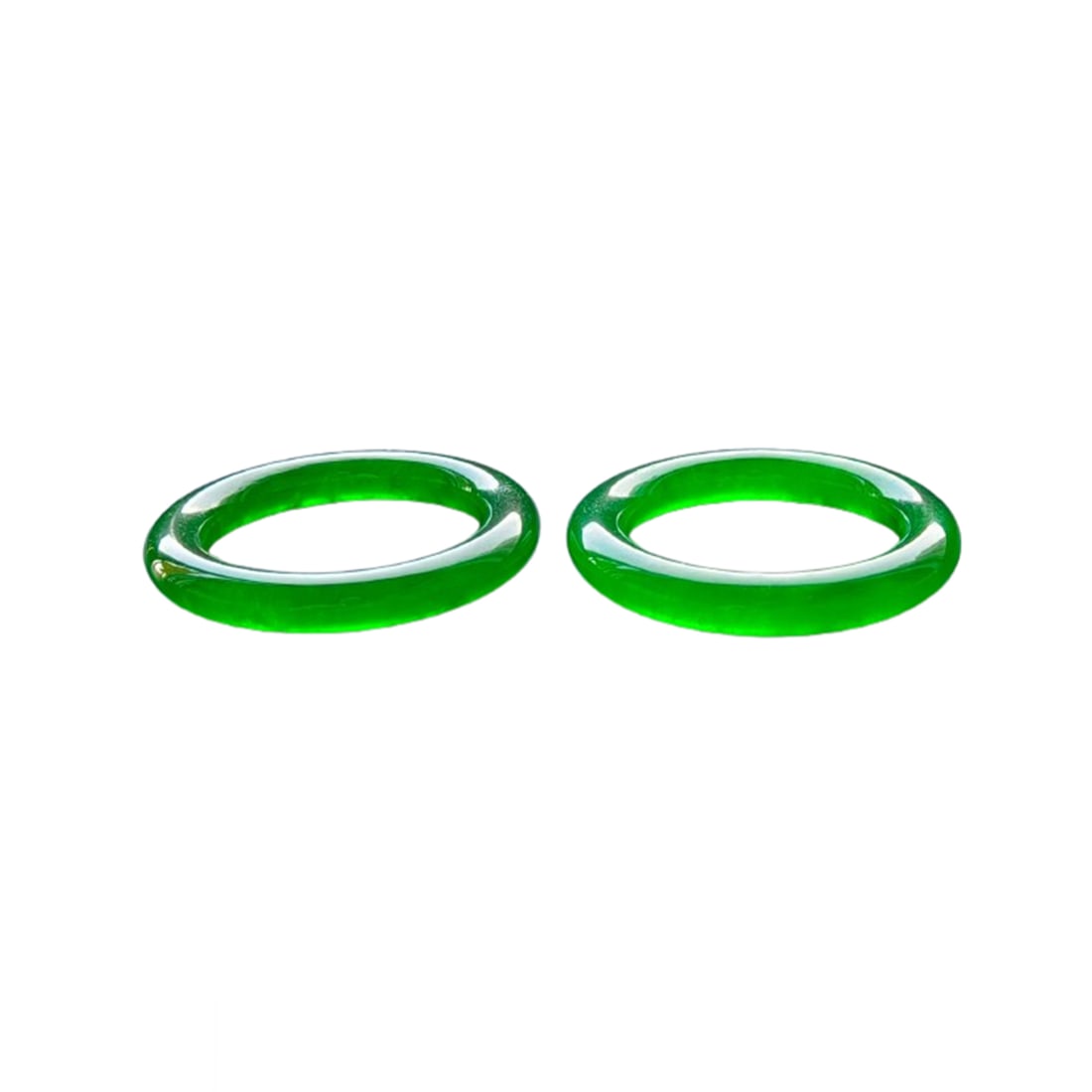 A pair of dragon stone imperial green jadeite bracelets (1 of 9)