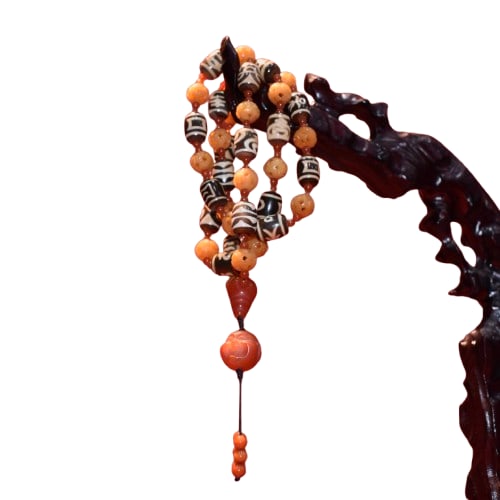 Tibetan Dzi Bead Agate Multi-Treasure Necklace: [Specifications] 10MM ox bone, 12*16MM Dzi beads.[Match] Himalayan yak bone, various Dzi beads totems.[Introduction] Duobao necklace is not only a kind of ornament, but also a cultural symbol and spir