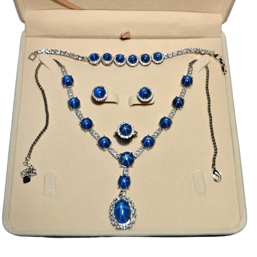 Starlight Gemstone Jewelry Four-piece Set: Starlight Gemstone Jewelry Four-piece Set. The gemstone hardness is above nine, details as shown. Thickness 2cm Width 1.5cm Weight 80g Freight: 1.International Shipping: Foreign shipping costs are det