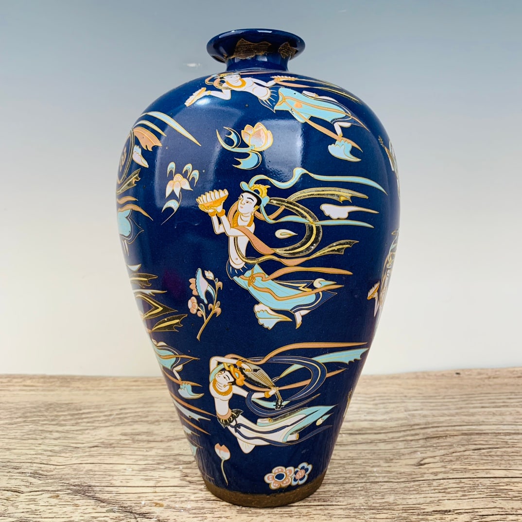 Jian kiln sapphire blue glaze plum vase with flying apsaras pattern: Jian kiln sapphire blue glaze plum vase with flying pattern, height 28 cm, diameter 16 cm Freight: 1.International Shipping: Foreign shipping costs are determined by the destination. 2.Photos, descrip