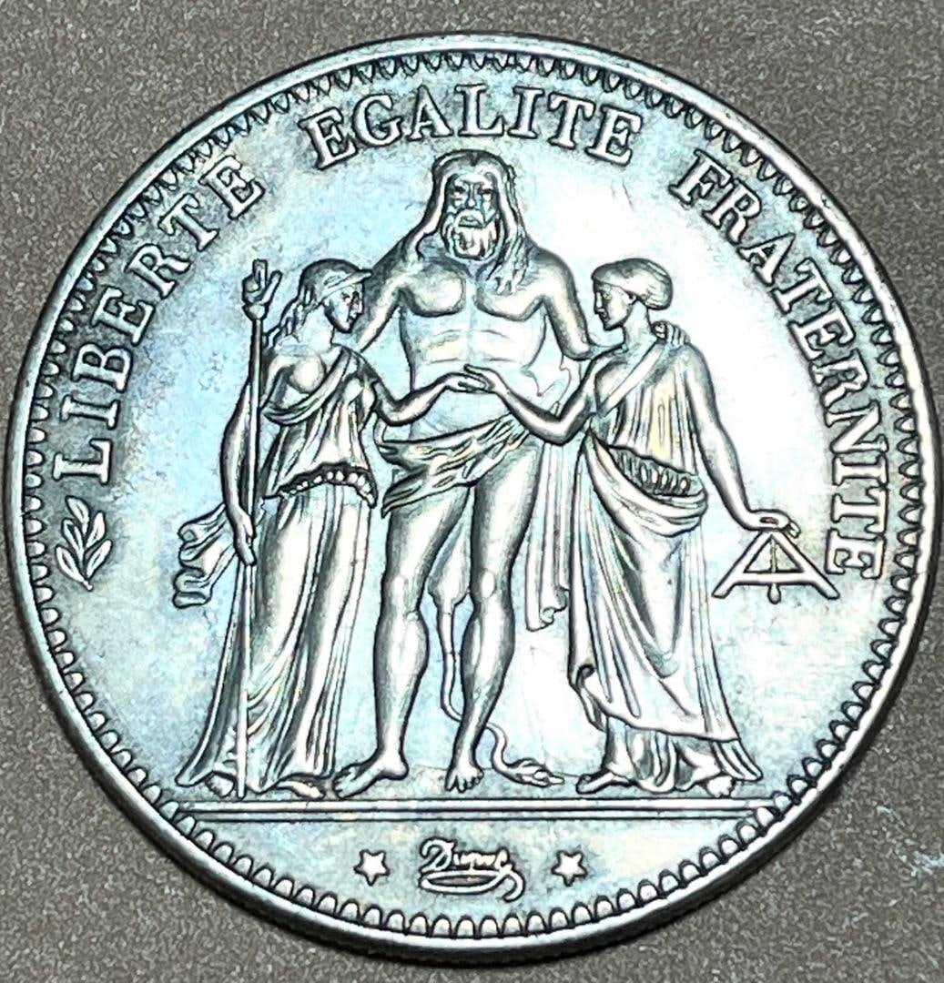 1873 French 5 Franc Silver Coin: Design of the 5 franc silver coin Liberté Égalité Fraternité issued in 1873.Design: Liberté Egalité Fraternité patternValue: 5 francsYear of issue: 1873Country: France Freight: 1.International
