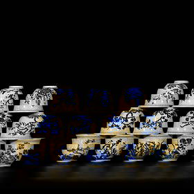 A set of twelve flower god pattern blue and white cups in the Chenghua style: This set of twelve blue and white porcelain cups features the twelve flower deity patterns, each cup measuring 5.3x6.5 centimeters. The twelve cups are decorated with classic blue and white craftsmans