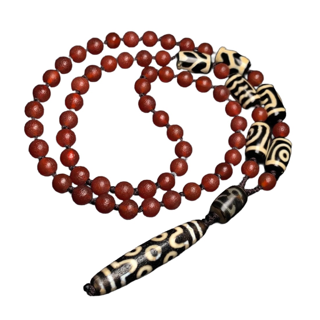 Seven-eyed Dzi bead combined with multi-bead Dzi and red agate beads, carefully woven into a (1 of 9)
