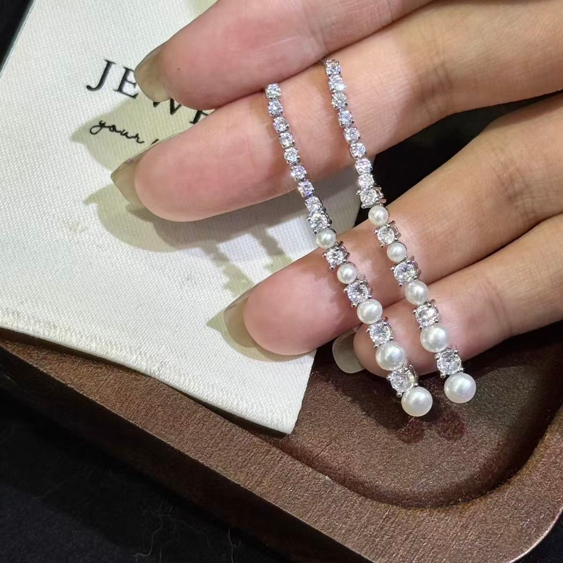 Graduated Freshwater Pearl Earrings: Natural freshwater pearl gradient earrings. Very delicate in overall.