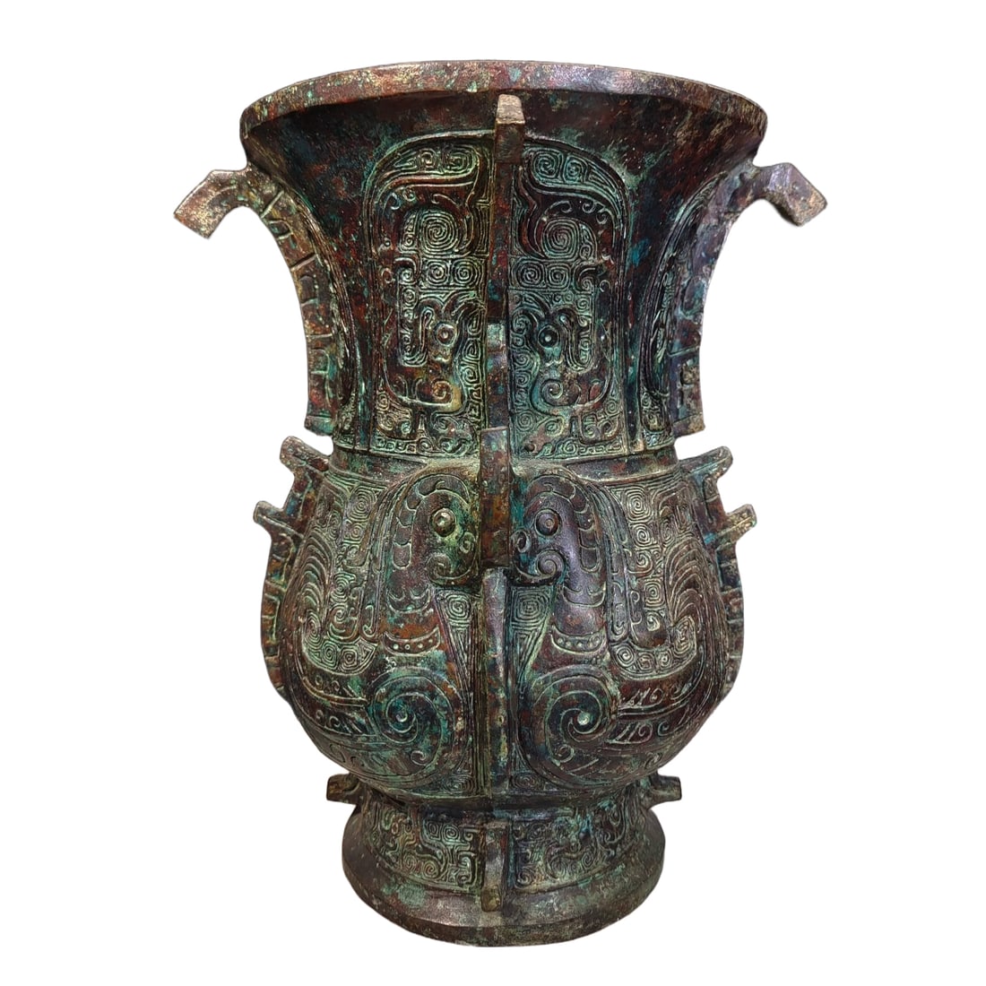 Bronze Vessel with Wind Pattern Zun: Western Zhou dynasty style bronze vessel with wind pattern zun, a ritual vessel for holding wine with rich and luxurious decorations, with inscriptions at the bottom. In ancient times, the wind was re