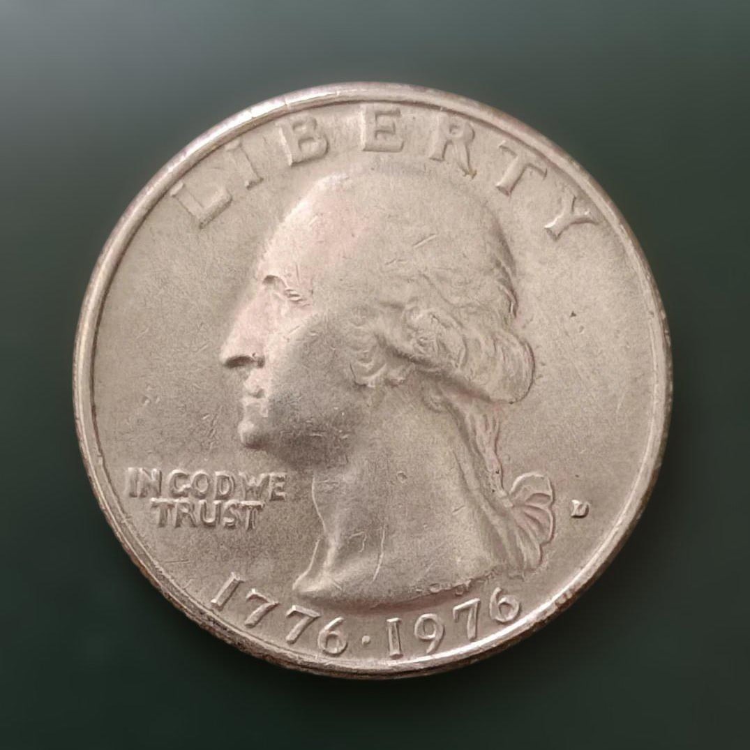 United States Bicentennial 25 Cent Coin: United States Bicentennial Quarter CoinPortrait of George Washington. 1776-1976 United States Bicentennial commemorative stampCoins minted in 1975 and 1976The reverse features a drummer from the