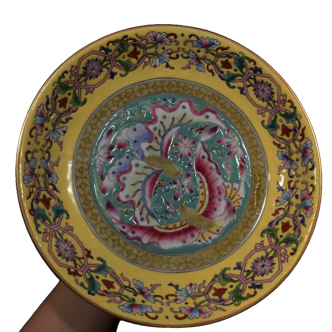 Enamelled porcelain plate with yellow glaze, butterfly and floral pattern, 'Fortune and Longevity': Enamel porcelain yellow ground glaze butterfly floral Fu Shou plate. Good fortune is at hand, floral border, thick glaze, paste surrounding, full of floral patterns, fine crackle, height 43mm,