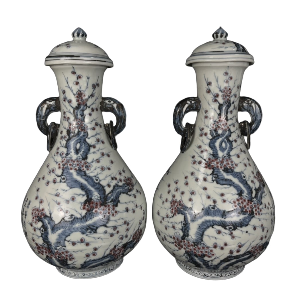 A pair of double-ear vases with blue and white plum blossom decorations from the Hongwu period of (1 of 10)