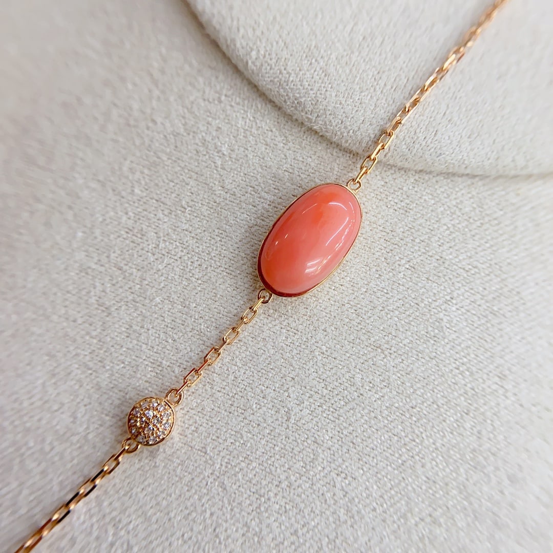 18K Gold Diamond Red Coral Bracelet: 18K Gold Diamond-Set Red Coral Bracelet, Pink Coral Cabochon, Jelly-like TextureRaw Stone 14.9×7.6mm
