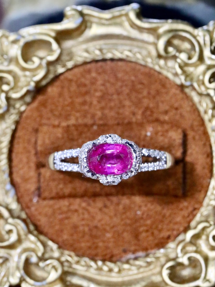 18k Ruby Ring: 18k Ruby RingTotal weight 2.35g, main stone 0.77ct diamond, 0.303ct