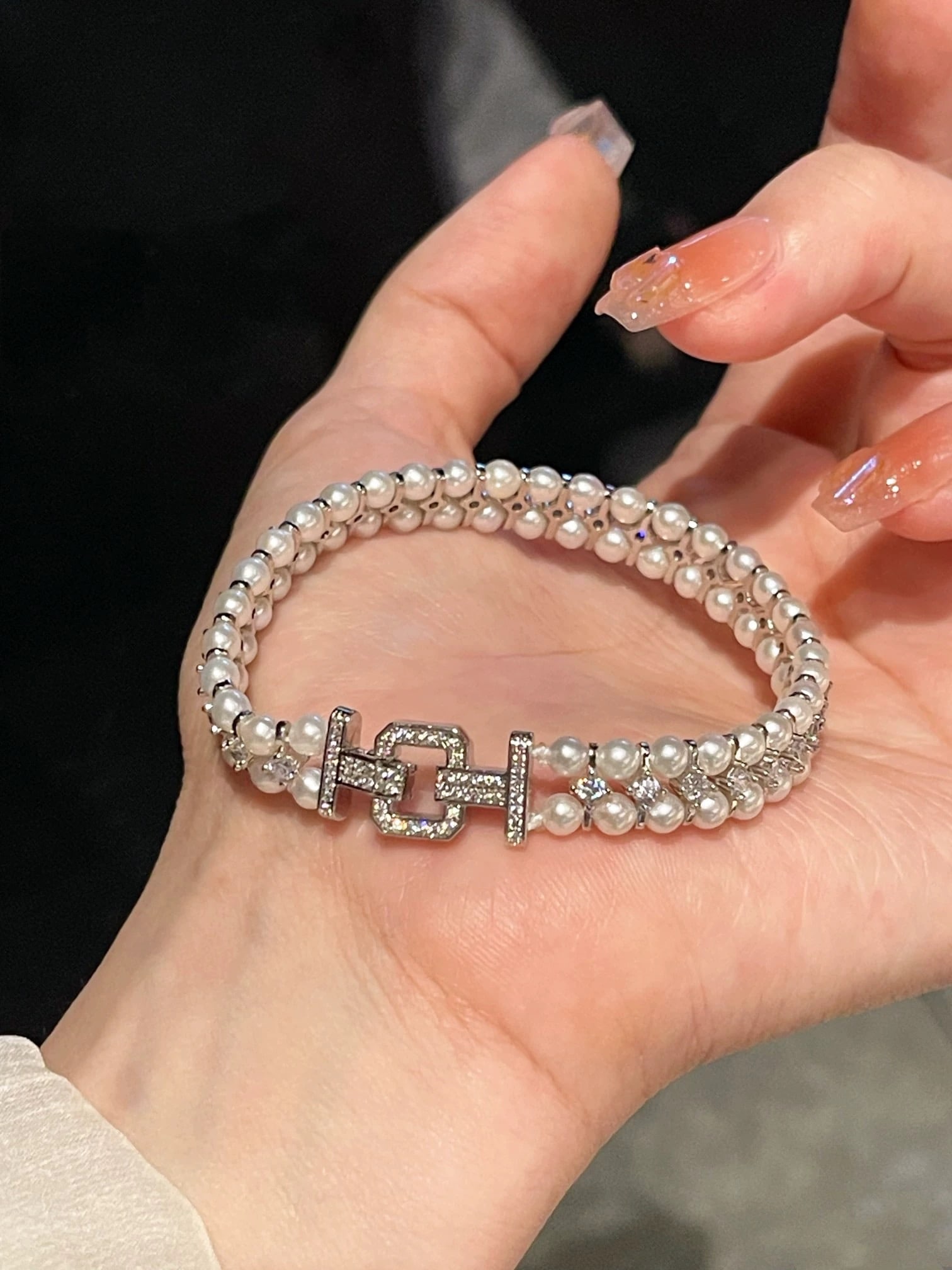 Geometric double-row pearl bracelet: Geometric double-row bracelet with square buckle, 3-4mm near-round high luster slightly flawed natural high-quality freshwater pearls, 14k gold-plated handmade