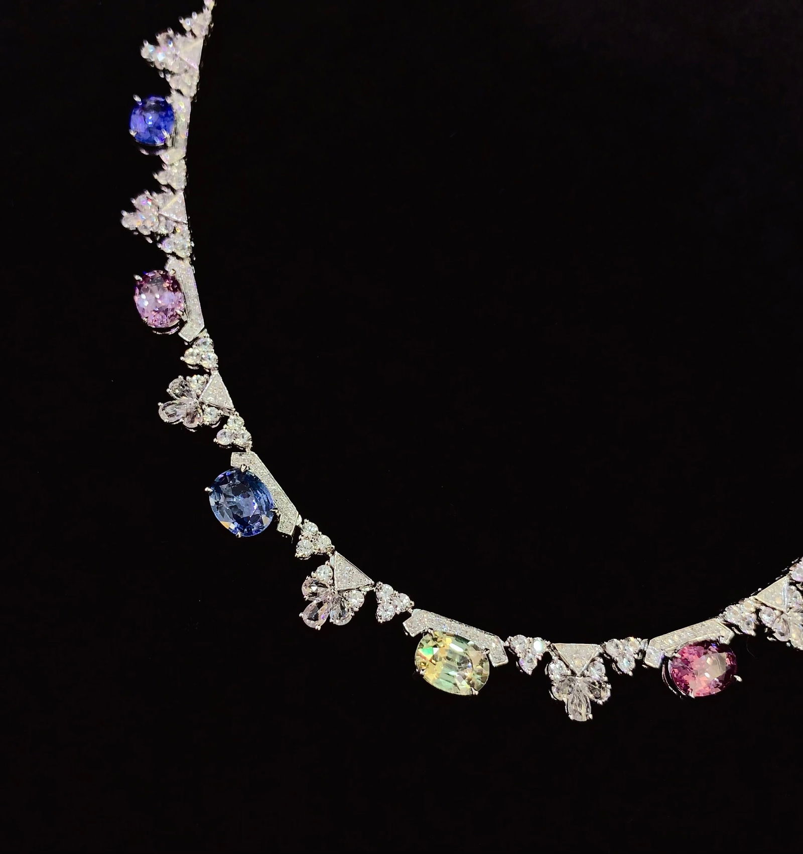 18k Natural Untreated Blue Sapphire Necklace: 18k Natural Untreated Blue Sapphire NecklaceTotal weight: 18.01 gramsMain stone: 7.7 caratsDiamonds: 87White sapphires: 104