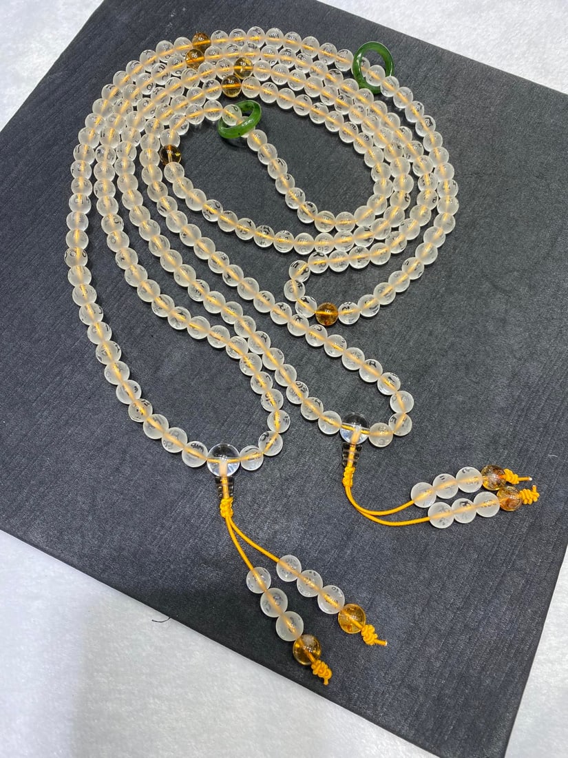 Natural White Crystal Six-Character Mantra 108-bead Buddhist Rosary Necklace, can be used as prayer: Natural White Crystal Six-Character Mantra 108-bead Buddhist Rosary Necklace, can be used as prayer beads or car hanging. Paired with natural yellow tower crystal and jade fortune ring. Size 9.5mm