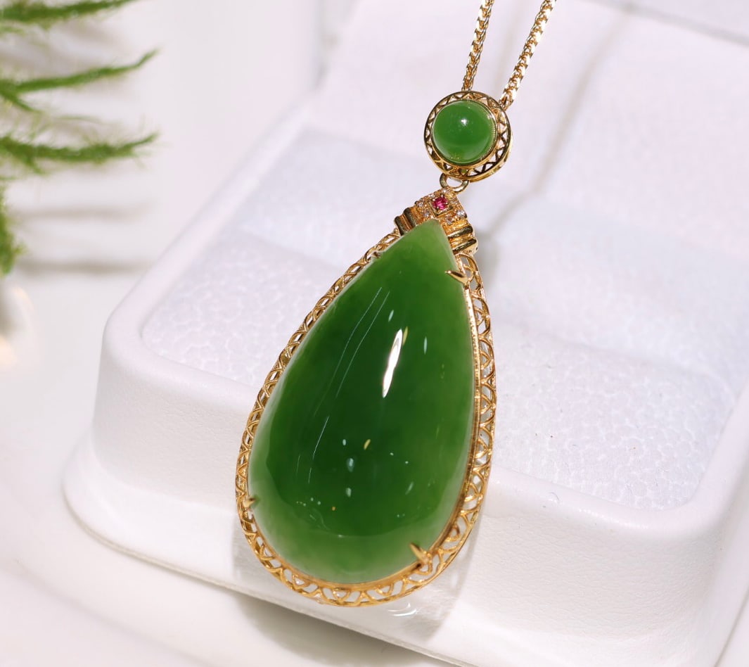18K Gold Plated with Diamonds, Jade Pendant: 18K Gold Plated with Diamonds, Jade PendantJade Size: 17x30mm TeardropBeautiful Color, Smooth and Lustrous, Includes a Silver Chain