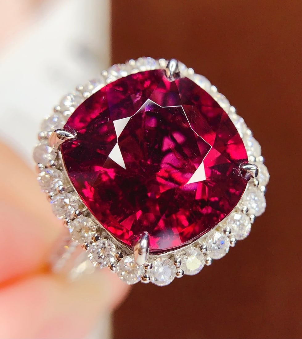 18k Natural Tourmaline Ring: 18k Natural Tourmaline RingTotal weight: 6.30 gramsMain stone: 9.28 caratsDiamonds: 32