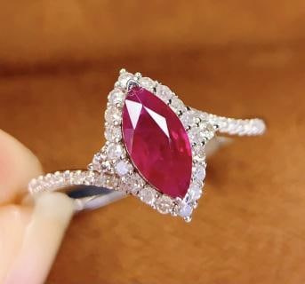 18K Natural Burmese Ruby Ring: 18K Gold Natural Myanmar Ruby Ring Total Weight: 2.12 gramsMain Stone: 0.7 caratsDiamonds: 40 pieces