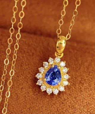 18K Gold Sapphire Necklace: 18K Gold Sapphire Necklace Total Weight: 1.34g 00011555Main Stone: 0.4 caratsDiamonds: 14 pieces