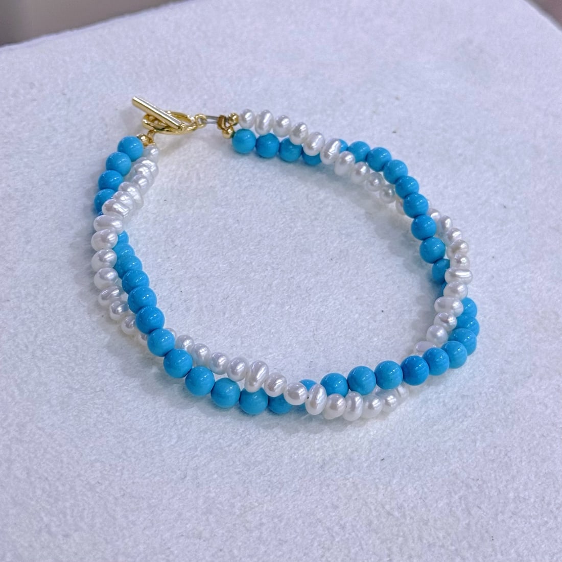 Natural Pearl Bracelet: Natural white pearl bracelet with blue pine design double braided chain, very elegant and fresh.