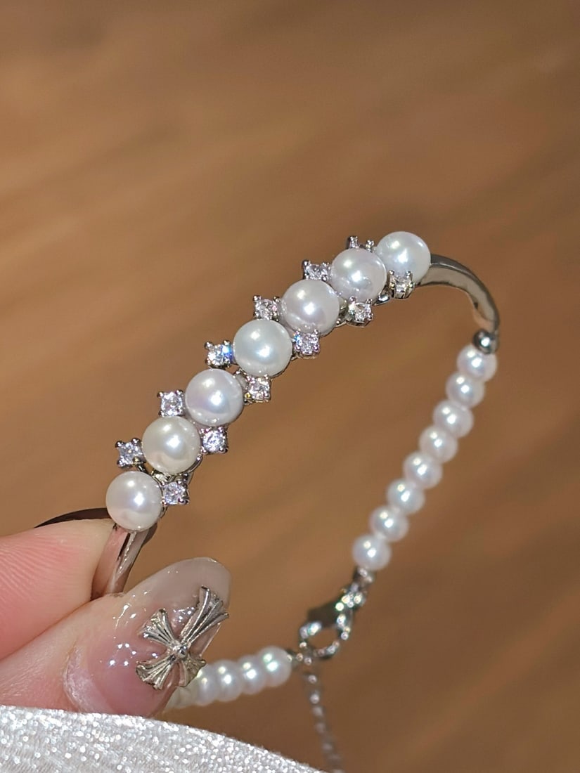 Pearl Bracelet: Select seven full and glossy 4-7mm natural freshwater pearls with fine details, adjustable tail