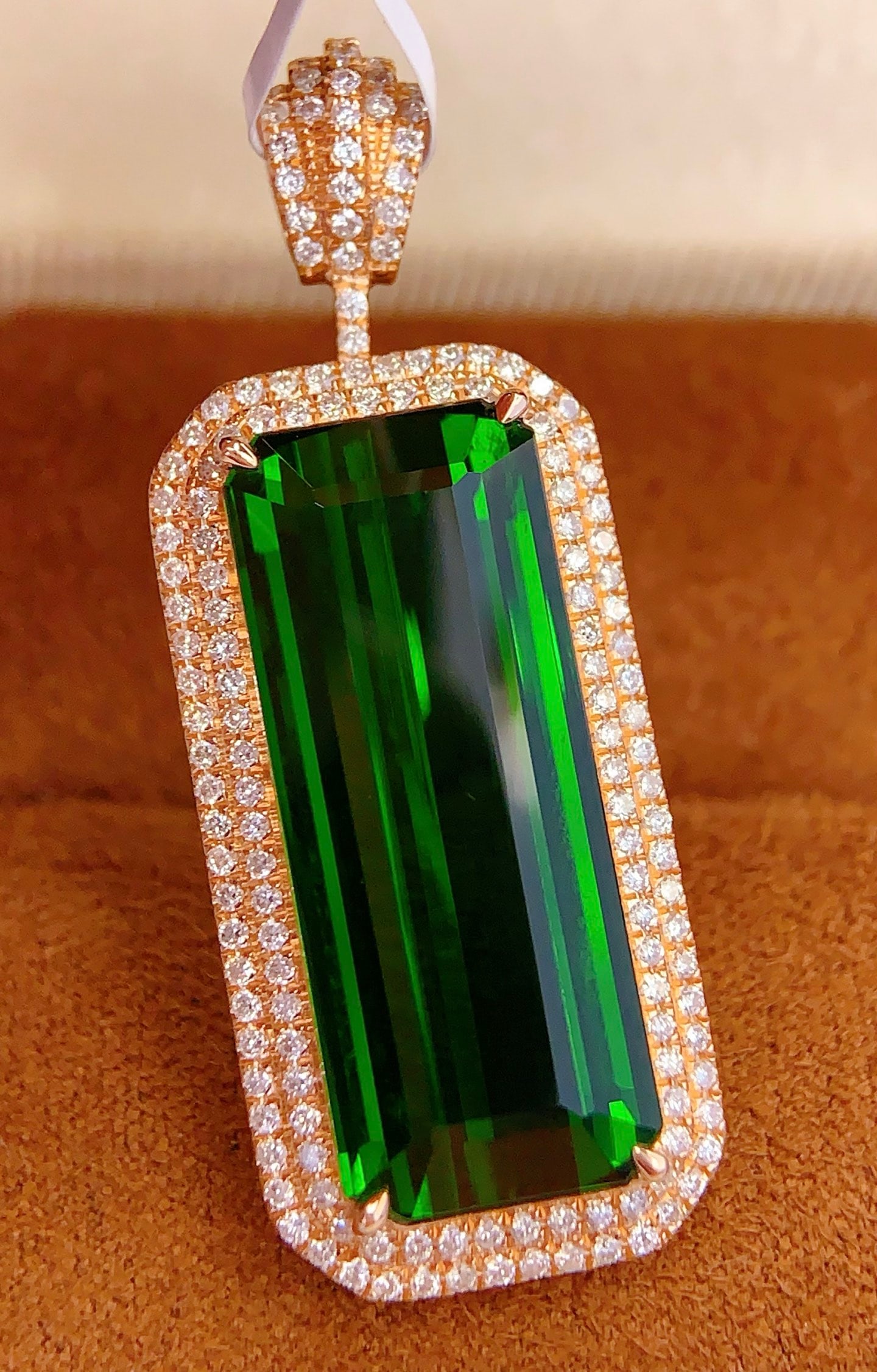 18K Gold Natural Tourmaline Pendant: 18K Gold Natural Tourmaline Pendant Total Weight: 8.26 gramsMain Stone: 19.66 caratsDiamonds: 162 pieces