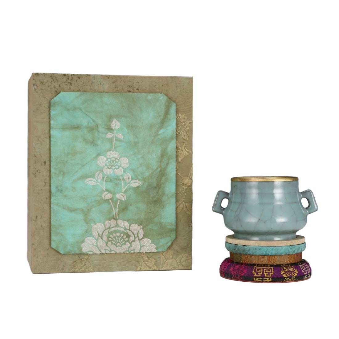 Antique Song Dynasty Official Kiln Double-Handled Furnace: This Song Dynasty official kiln double-ear stove, with a height of 7 centimeters and a belly diameter of 11.7 centimeters, showcases the elegant artistic value of Song Dynasty porcelain with its grace