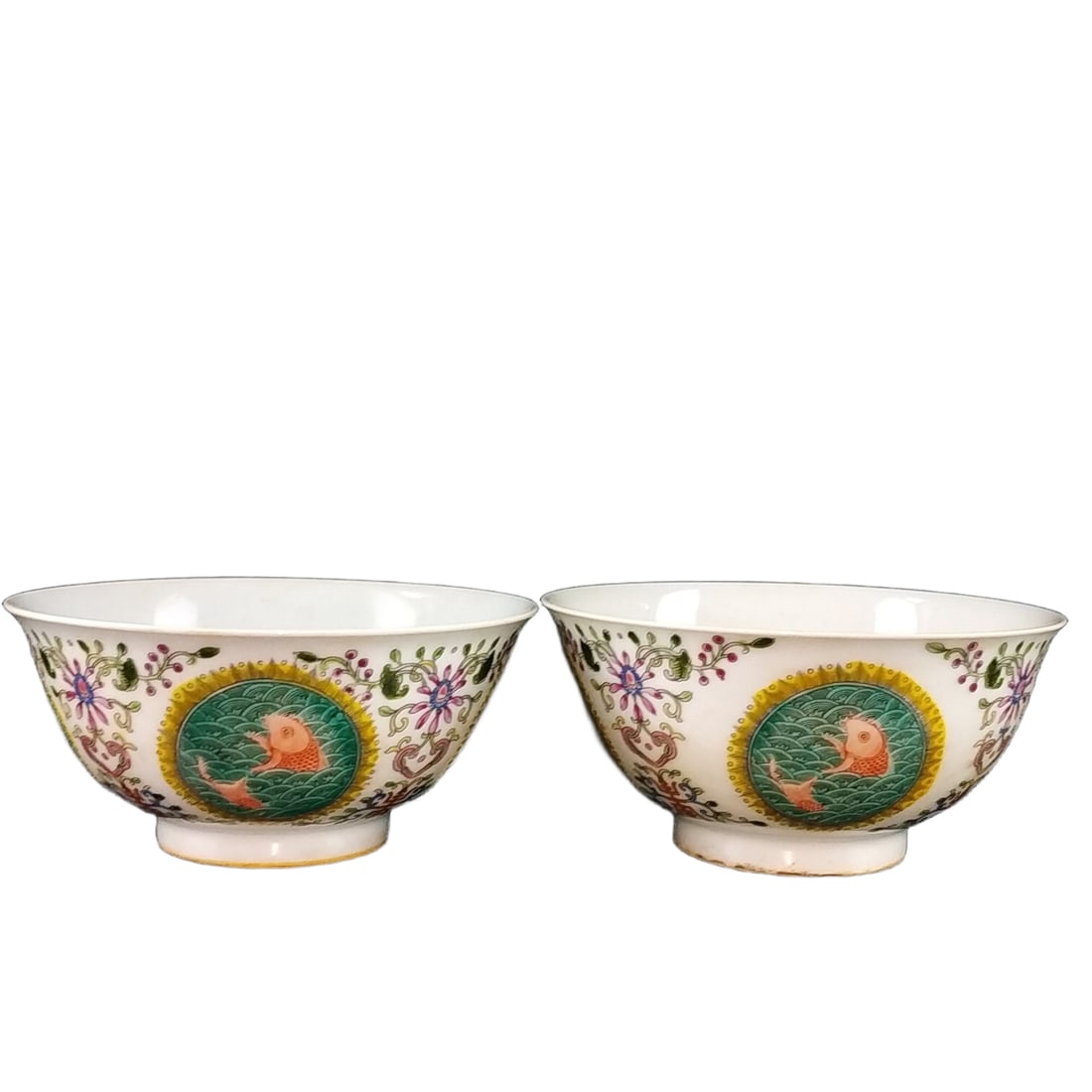 Qing Dynasty Qianlong Famille Rose Hand-painted Bowl with Abundant Surplus: This pair of Qing Dynasty Qianlong-period famille-rose hand-painted 'May You Have Abundance Year After Year' bowls are renowned for their exquisite craftsmanship and vibrant colors, showcasing the out