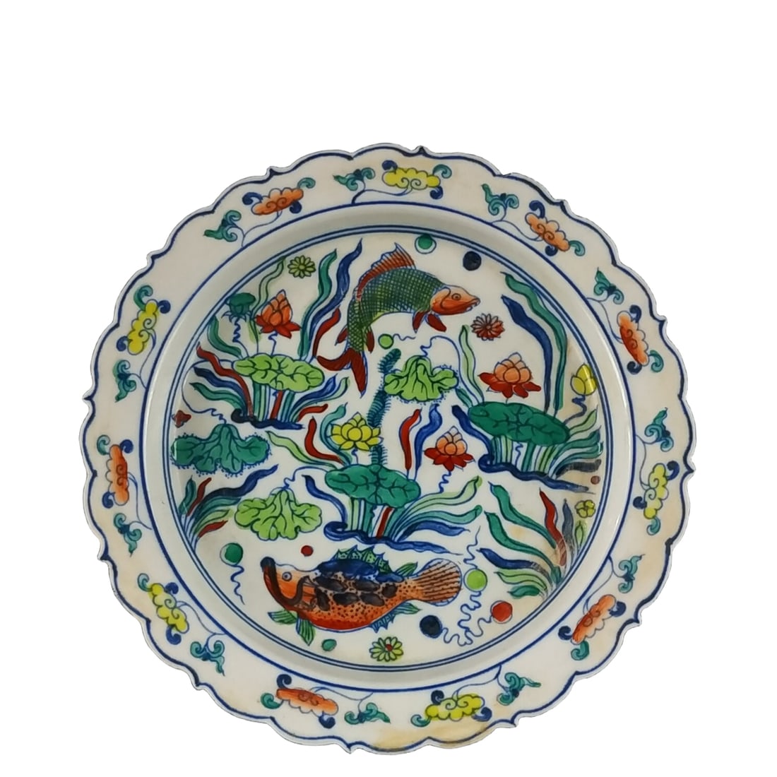 Ming Dynasty Chenghua Doucai Hand-painted Fish and Grass Pattern Plate: The Chenghua period Doucai hand-painted fish and aquatic plant design plate from the Ming Dynasty showcases the delicate and exquisite craftsmanship of the era. The lively fish and plant patterns on t