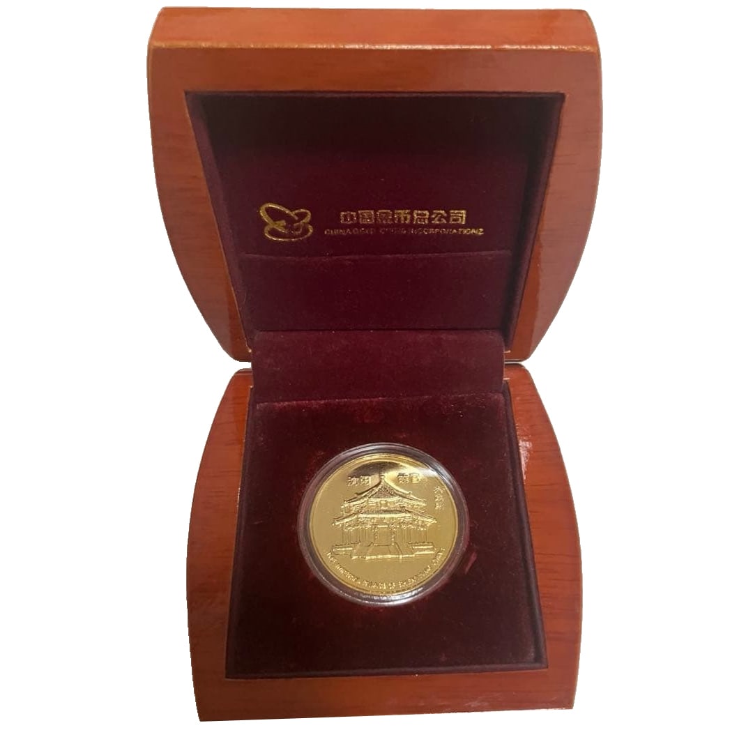 Commemorative Medal Issued by China Metalworking Group Corporation: China Gold Coin Corporation (now known as China Gold Coin Group Co., Ltd.) is the issuer of the Panda Gold Coin.Design: The gold coin features the Imperial Palace in Shenyang on the obverse and a rose
