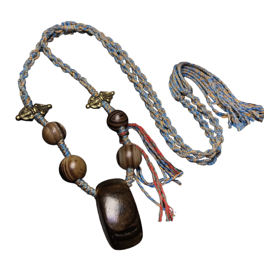 A necklace made of a single eye of heaven stone.: Eye of Heaven stone bead necklaceEye of Heaven stone size: 40x20x17 millimeters Collectible value: The Eye of Heaven stone is a natural stone formed during the geological movement and sedimentary