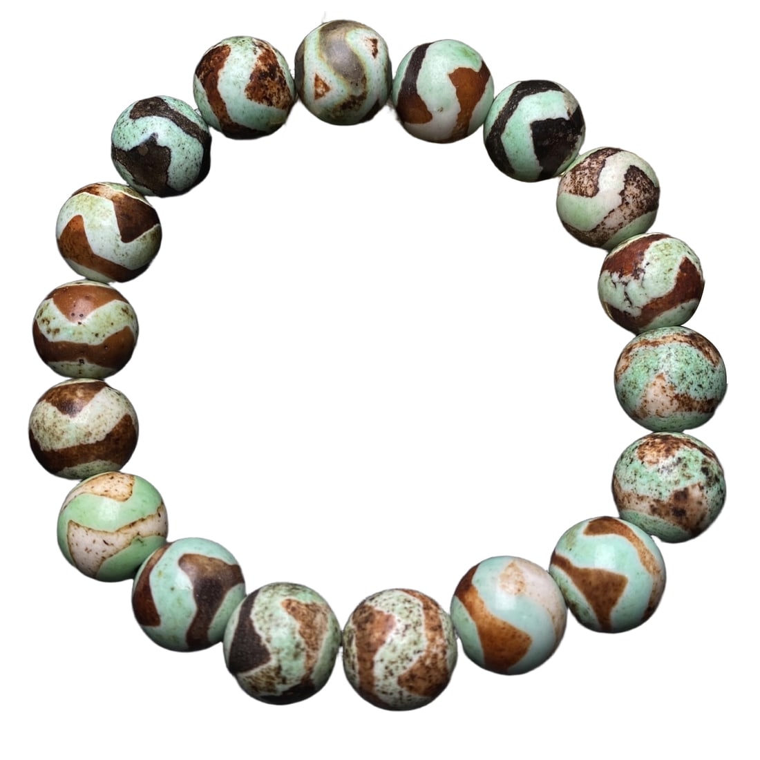 Natural agate tiger tooth dzi bead bracelet: Tiger Tooth Bead BraceletSize: 12mm x 18 beadsThe ancient beads have a rich and mellow patina with weathering traces, and a delicate orange peel pattern.