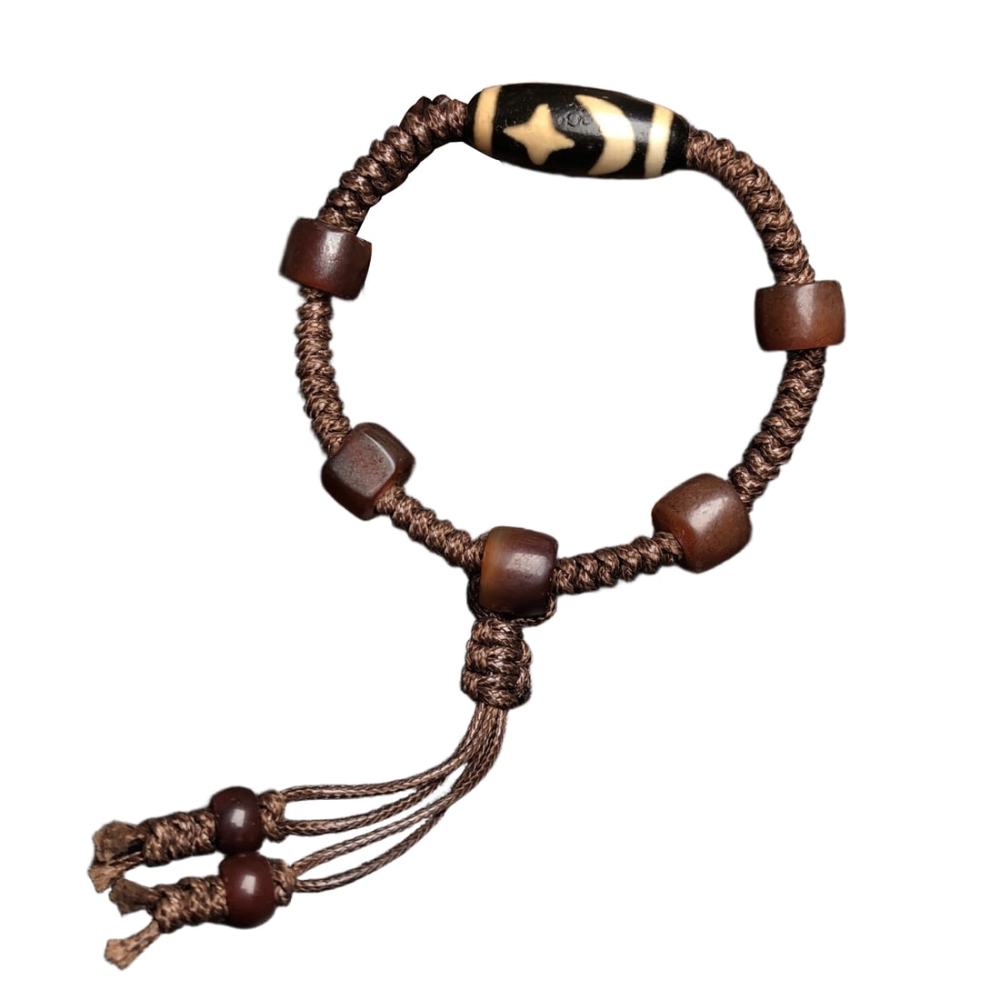 Sun, moon, stars, and heavenly pearls are combined with old agate beads to create a woven bracelet.: Sun, moon, stars, and sky beads paired with old agate beads to create a bracelet.Dimensions: Sun, moon, stars, and sky beads 27x11 millimeters, old agate beads 11x8 millimeters.