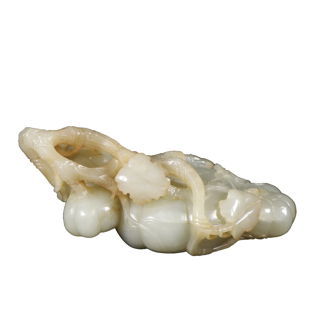 Qing dynasty He Tian jade three-piece melon and vine pattern ornament.: Qing Dynasty Hetian Jade Three Connected Gourd and Melon Pattern OrnamentSpecifications: 14.2cm in length, 6.4cm in width, 5.2cm in thickness, weighing 467gCarved from a whole piece of Hetian white ja