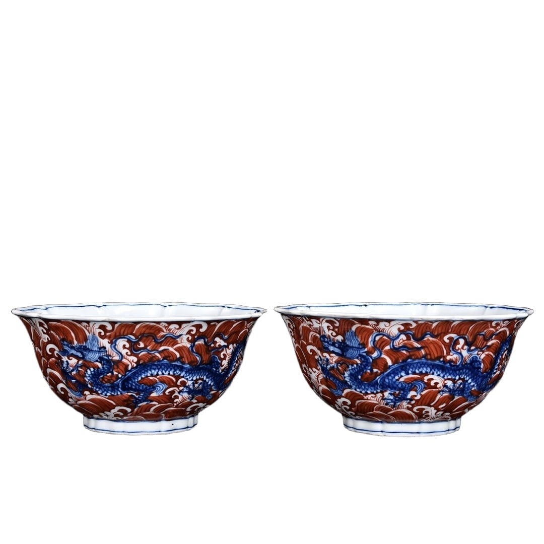 Ming Xuande blue and white copper-red dragon pattern ten-sided bowl: Ming Xuande blue and white bowl with iron-red dragon motif, featuring ten facets, measuring 7 cm in height and 18 cm in diameter. This bowl showcases royal majesty with its exquisite blue and white de