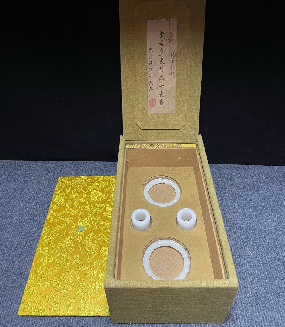Collection box packed Hetian jade bracelet and fingerstall.: A box containing a collection of Hetian jade bracelets and finger rings, suitable for collection or wearing. Box dimensions: 33×18×13 cmFinger ring size: 3.3×2.2 cm, weight 49 gramsBracelet thickne
