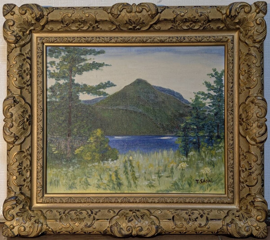 Signed Oil Painting (No.8) – Mountain and Lake Landscape: An original oil painting (No.8 size) depicting a scenic mountain and lake landscape, signed by the artist. The composition presents a tranquil natural setting, where serene waters reflect surrounding