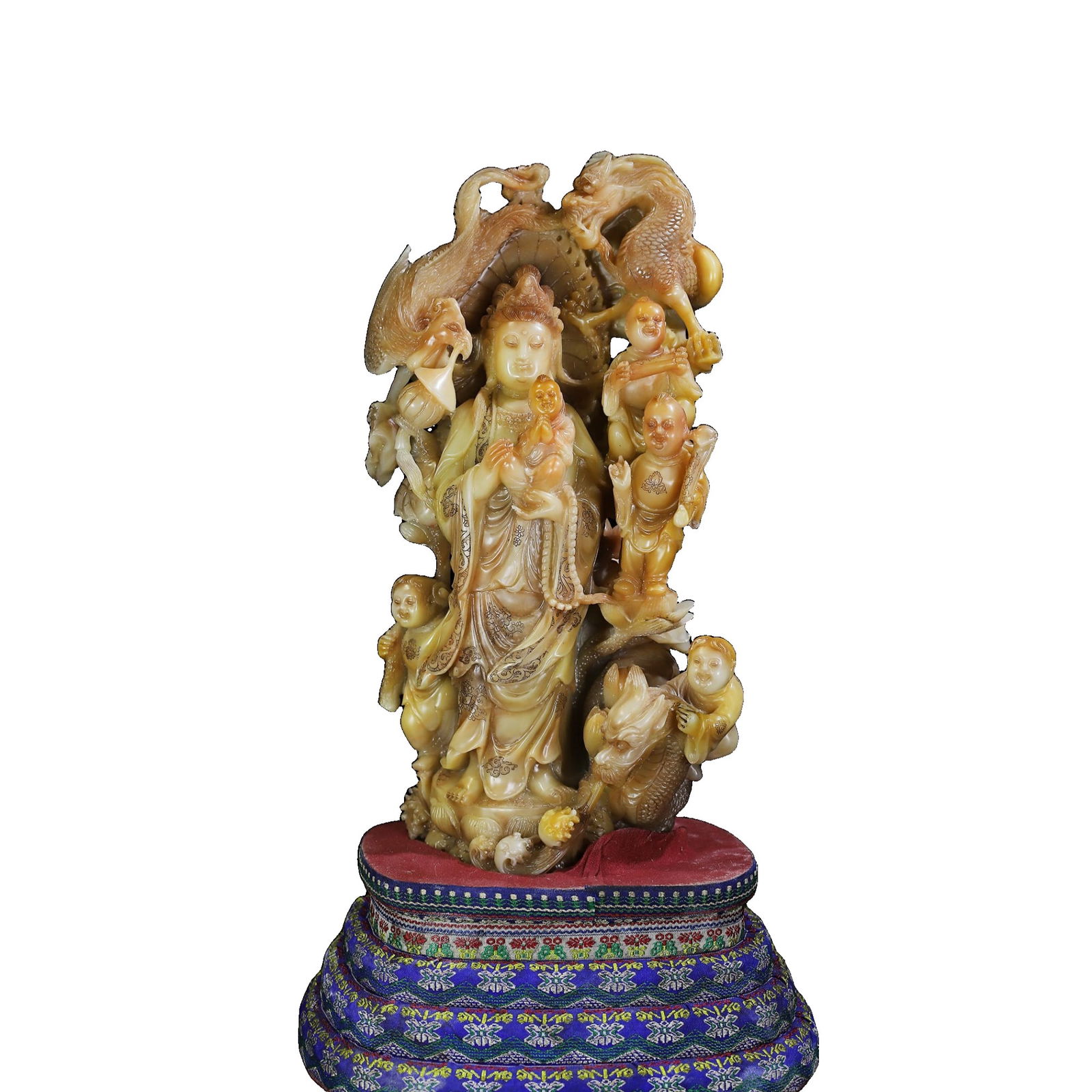 Cloth box containing a hand-carved Shoushan stone seal.: Antique Tibetan treasure, boxed in a handcrafted pure Shoushan stone seal. The carvings depict dragons, phoenixes, children, Guanyin, and famous figures, with exquisite craftsmanship, high relief dept