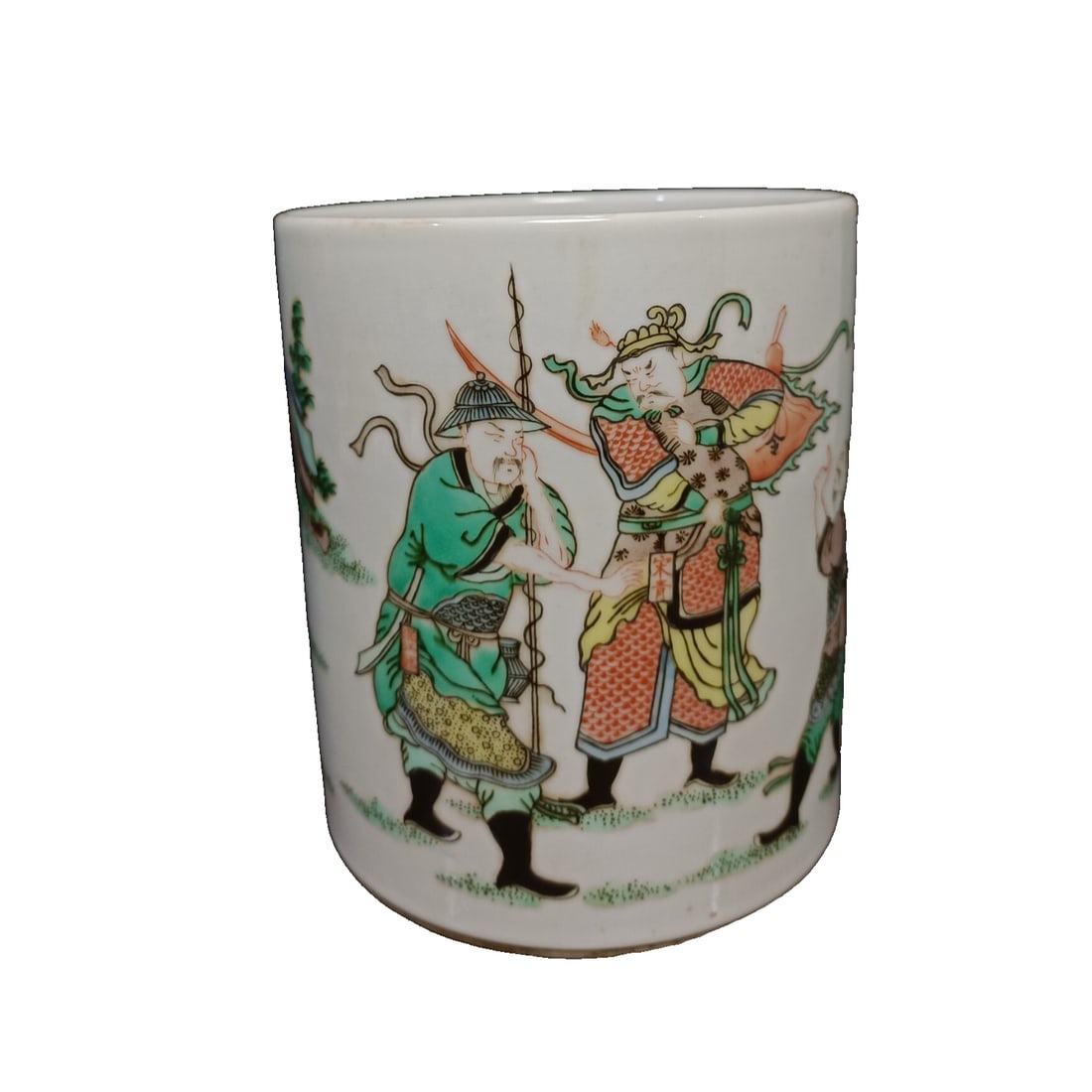 Qing Dynasty Kangxi five-color figure story pattern brush holder: This Qing Dynasty Kangxi period polychrome figure story pen holder is 14 centimeters high and 12 centimeters in diameter. The shape of the holder is dignified and heavy, with a well-proportioned and p