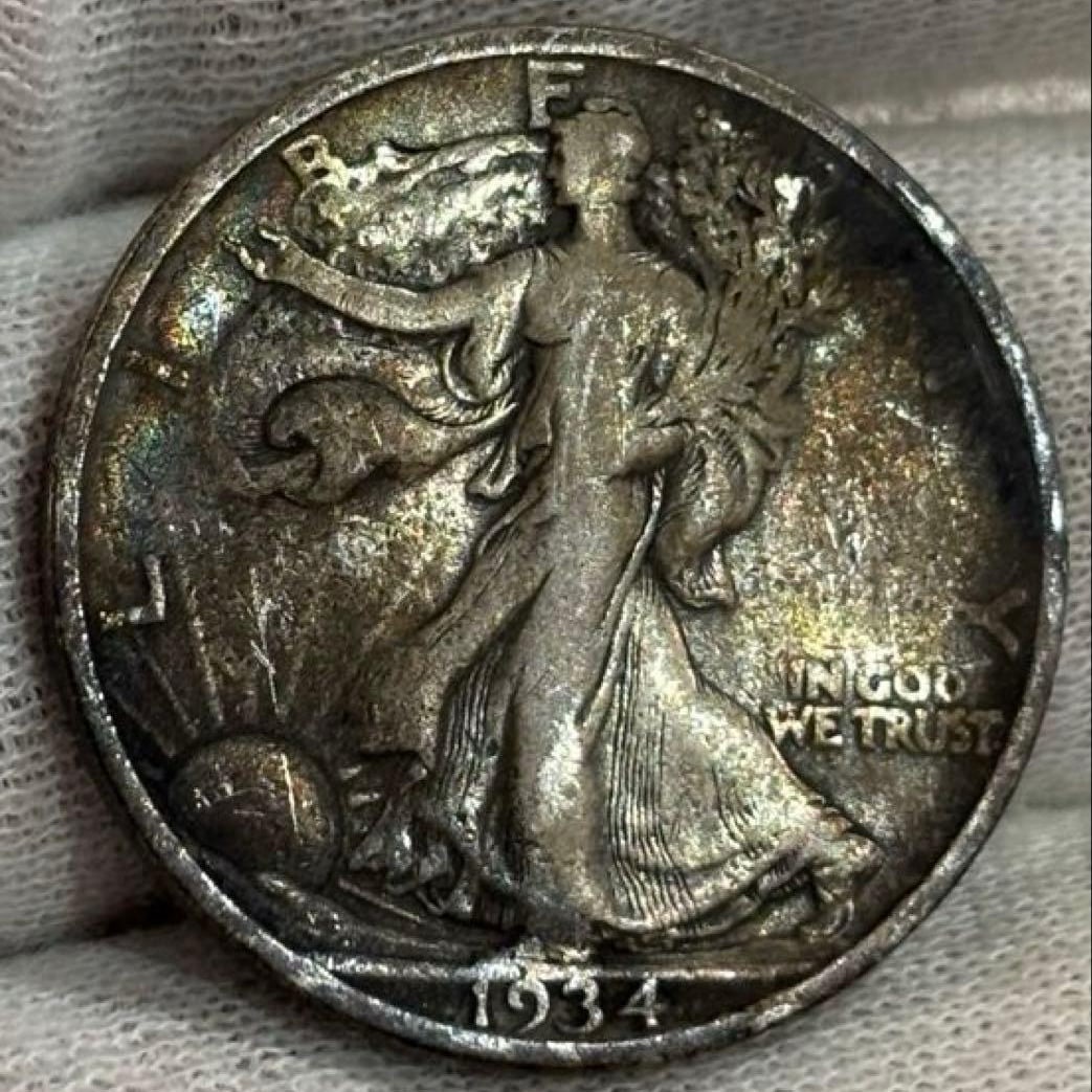 AS59 United States 1934 50 cents silver coin Walking Liberty.: This is a 1934 United States 50-cent silver coin. This is one of the popular "Walking Liberty Half Dollar" series, featuring a beautiful and powerful eagle as the design element on this classic Americ