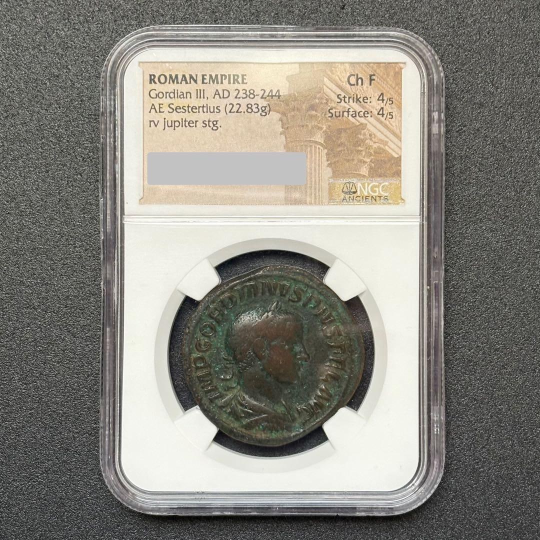 Roman Empire ancient coin, Gordian III, Septimius.: A bronze sestertius coin minted during the reign of Emperor Gordian III of the Roman Empire, featuring a standing statue of Jupiter on the obverse. Period: Roman Empire Emperor's name: Gordian III Dat