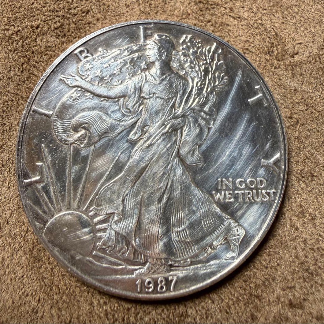 1987 American Silver Eagle coin, 31.63 grams of pure silver, 1 troy ounce Liberty Lady coin. (1 of 4)