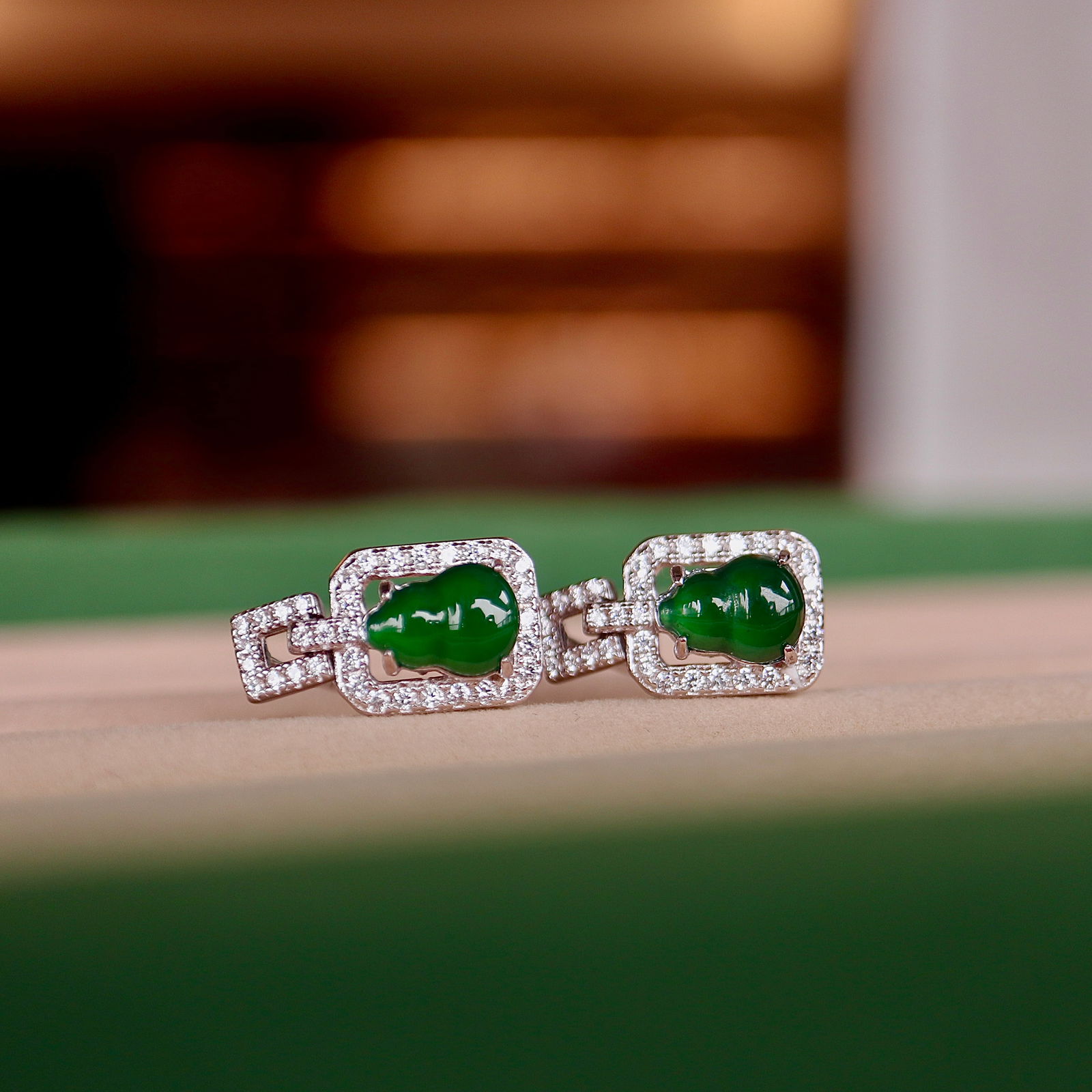 S925 silver natural jadeite stud earrings: These earrings showcase the exquisite beauty of natural jade, intricately set in S925 silver. Each earring is adorned with a 6x8mm jade stone, emitting a soft and enchanting green luster symbolizing e