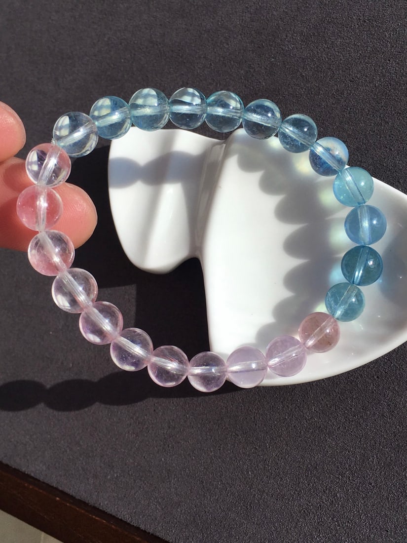 Natural Morganite Bracelet: This exquisite bracelet showcases the charming allure of natural Morganite, with each 8mm bead emitting a soft and vibrant peachy luster. The transparency of the crystals combined with expert craftsma