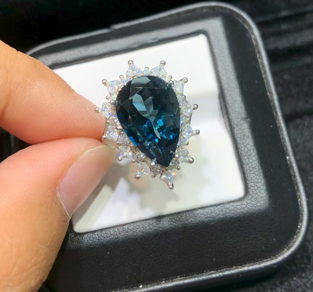 925 sterling silver natural topaz ring: This ring showcases a stunning natural topaz stone, with its deep blue color as mesmerizing as the deep sea. Set in exquisite s925 sterling silver, the ring's fine craftsmanship ensures a luxurious fe
