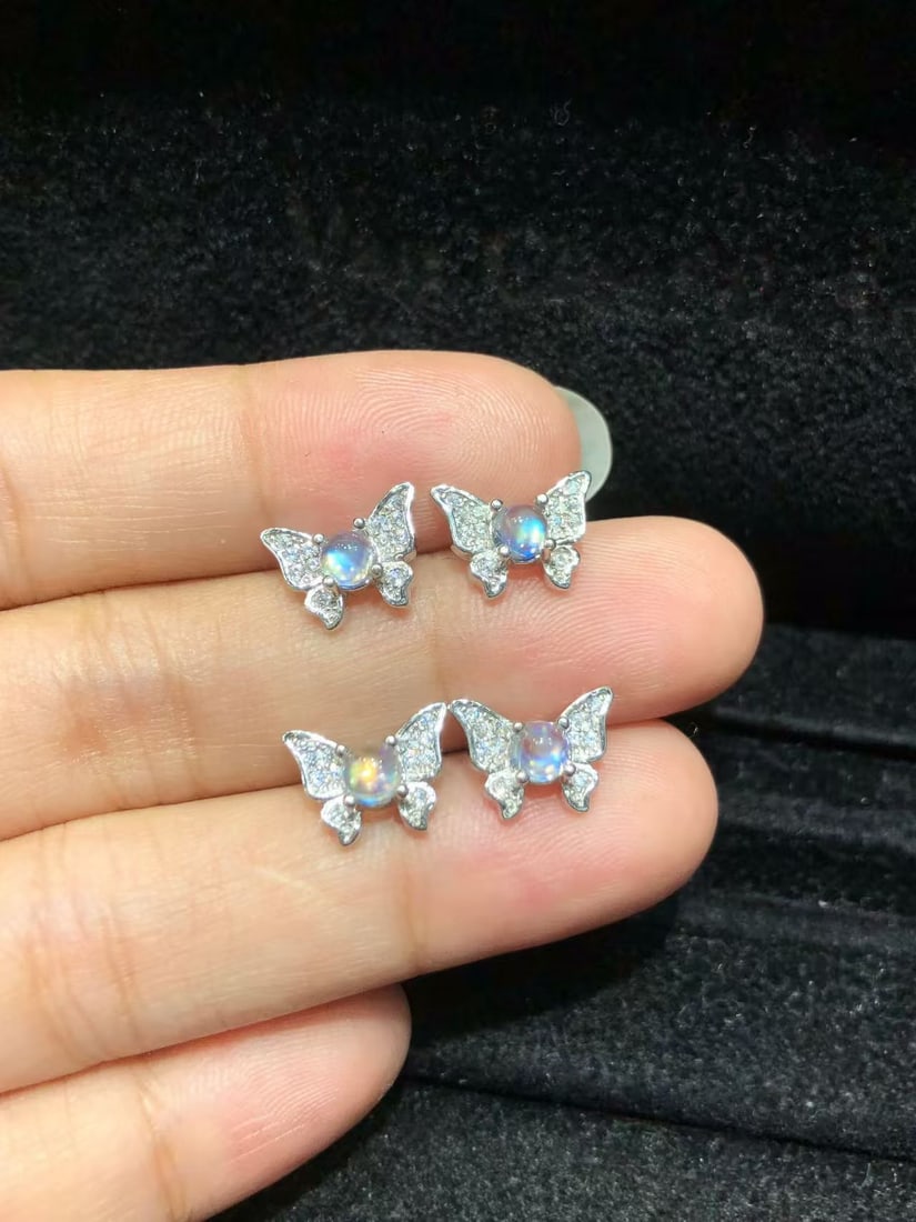 S925 Sterling Silver Natural Moonstone Earrings: These exquisite earrings showcase the ethereal beauty of natural moonstone, each intricately set in S925 sterling silver. The 4mm moonstone captures attention with its mysterious play of light,