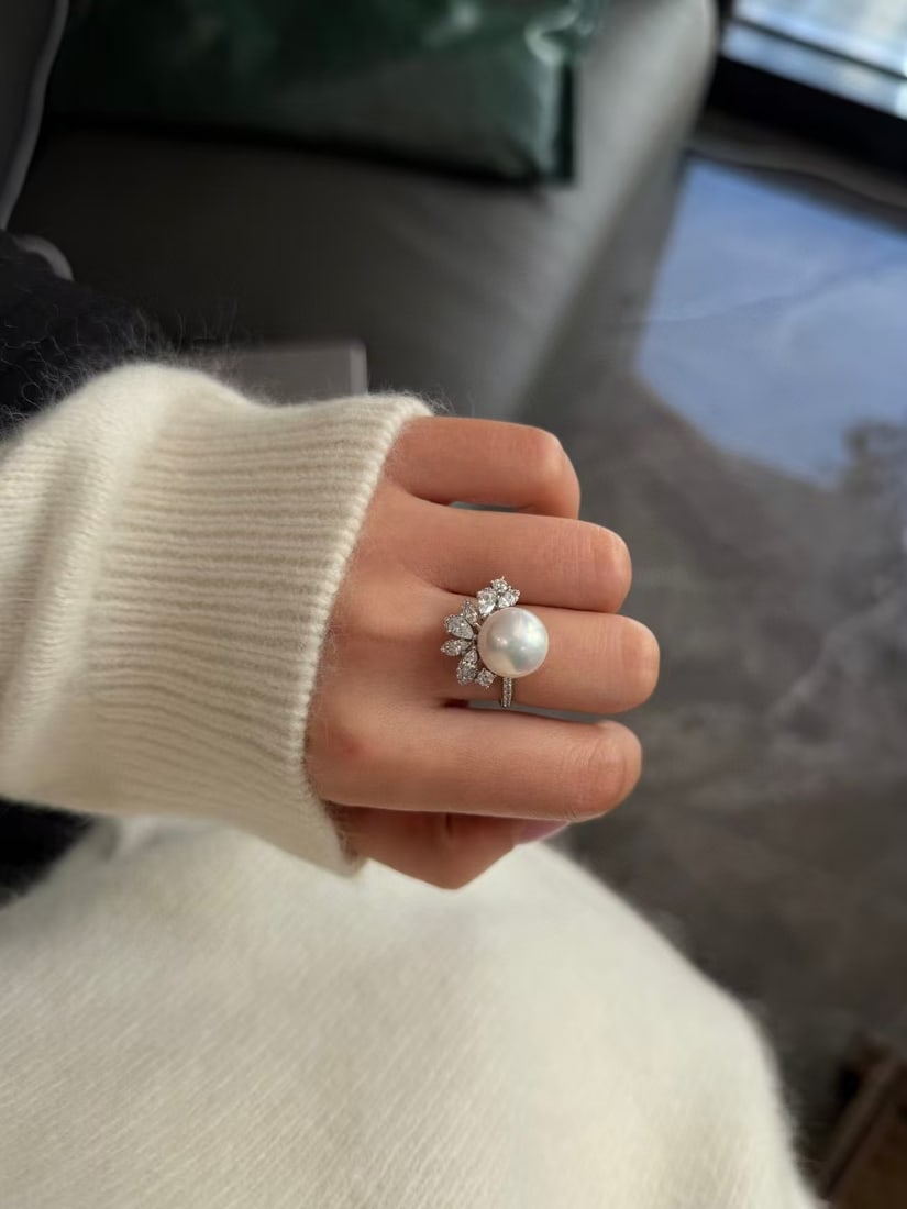 Silver Natural Edison Pearl Ring: This ring features a dazzling 12-13mm Edison pearl known for its perfect round shape and captivating aurora luster. Crafted with precision in 925 sterling silver, this piece captures the essence of el