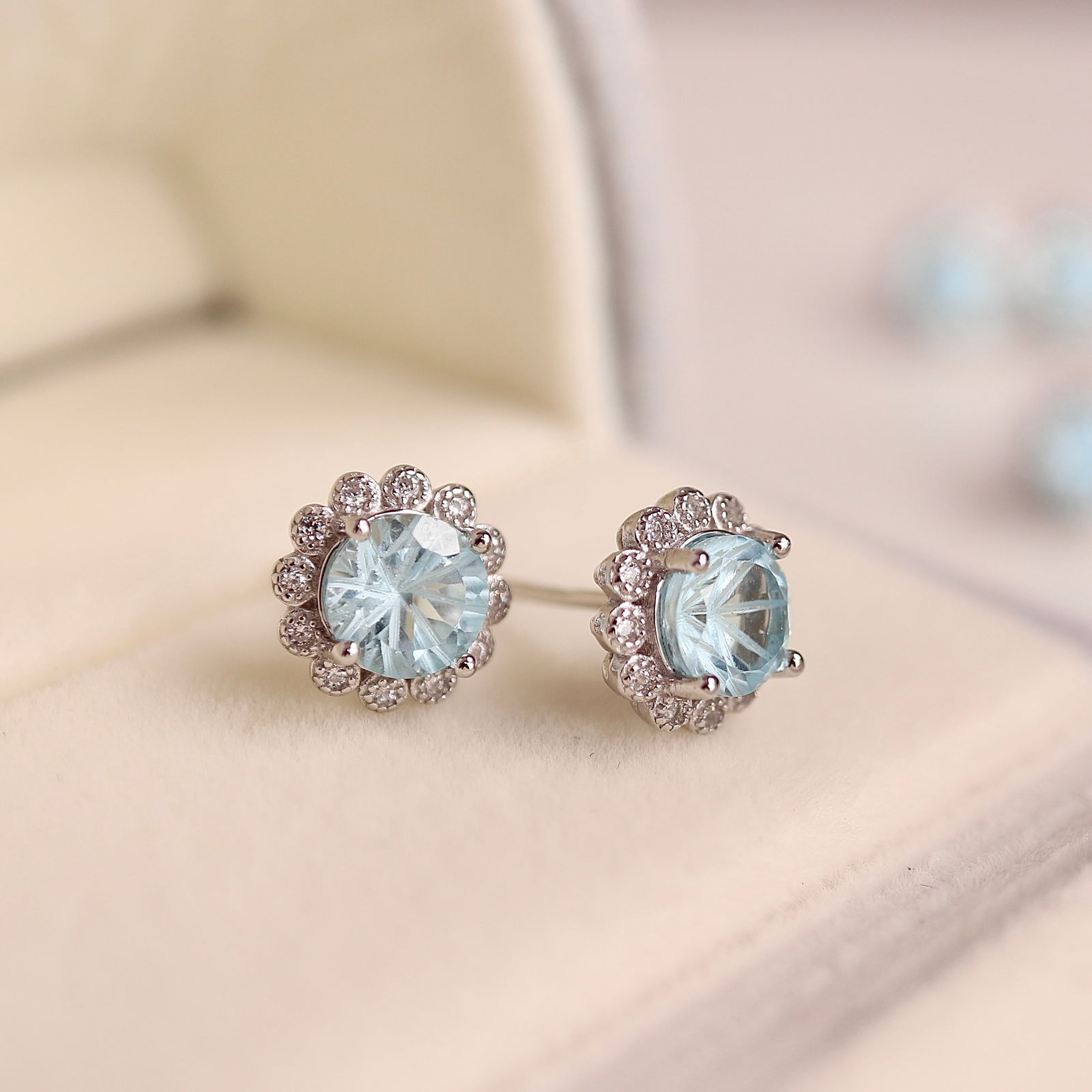 S925 silver natural topaz sunflower earrings: These earrings showcase the serene beauty of natural topaz, carefully set in S925 silver. Exquisitely crafted and delicately designed, resembling sunflower petals, they capture light, emitting