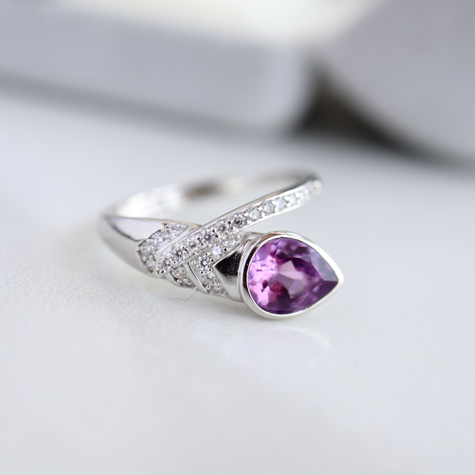 S925 Silver Natural Amethyst Ring: This ring showcases a stunning natural amethyst, renowned for its deep and captivating purple color. The gemstone is carefully cut into a diamond-like shape, measuring approximately 6x8mm, reflecting