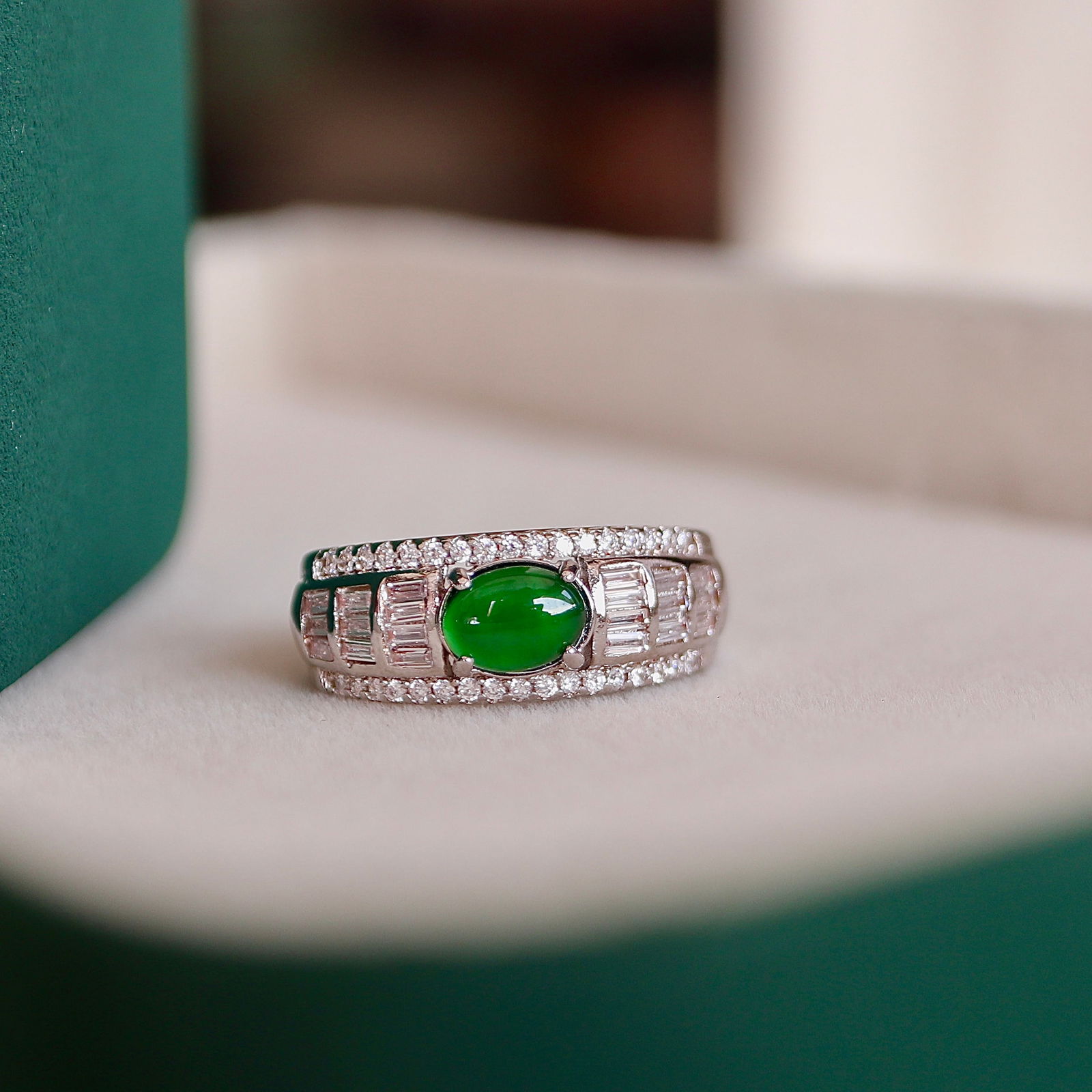 Natural jadeite Ring: This ring showcases a stunning natural jadeite gemstone, displaying a rich green color that captures the essence of nature's beauty. The craftsmanship is impeccable, combining simplicity and elegance